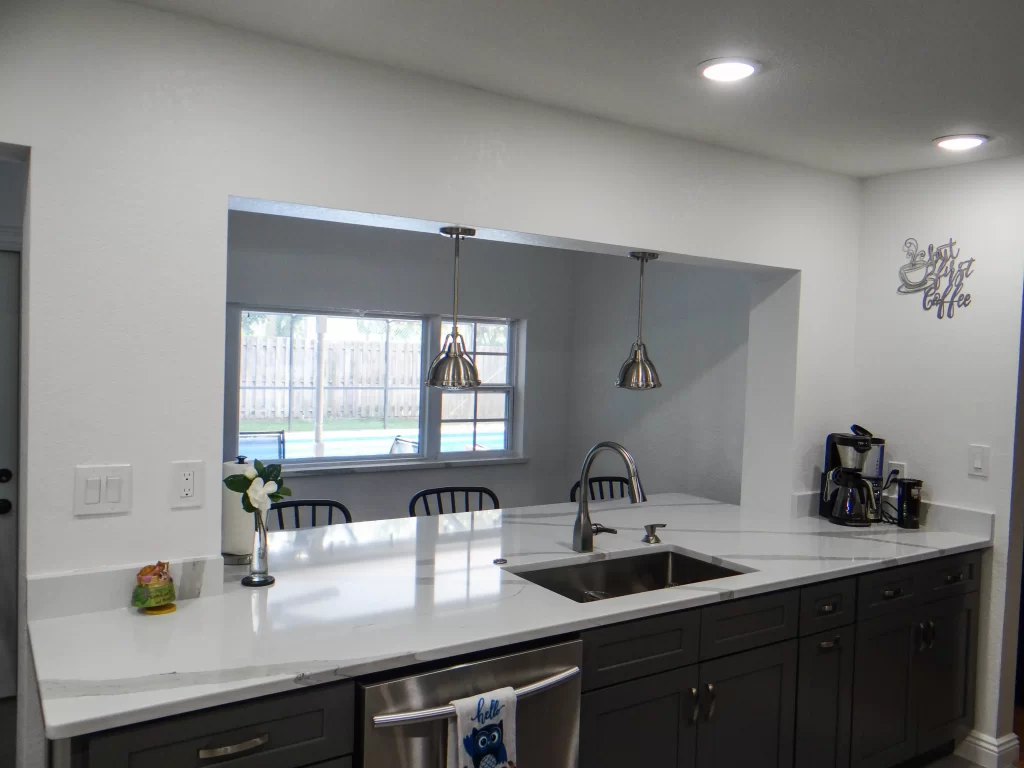 Kitchen remodel with new countertops and cabinets and Window Replacement